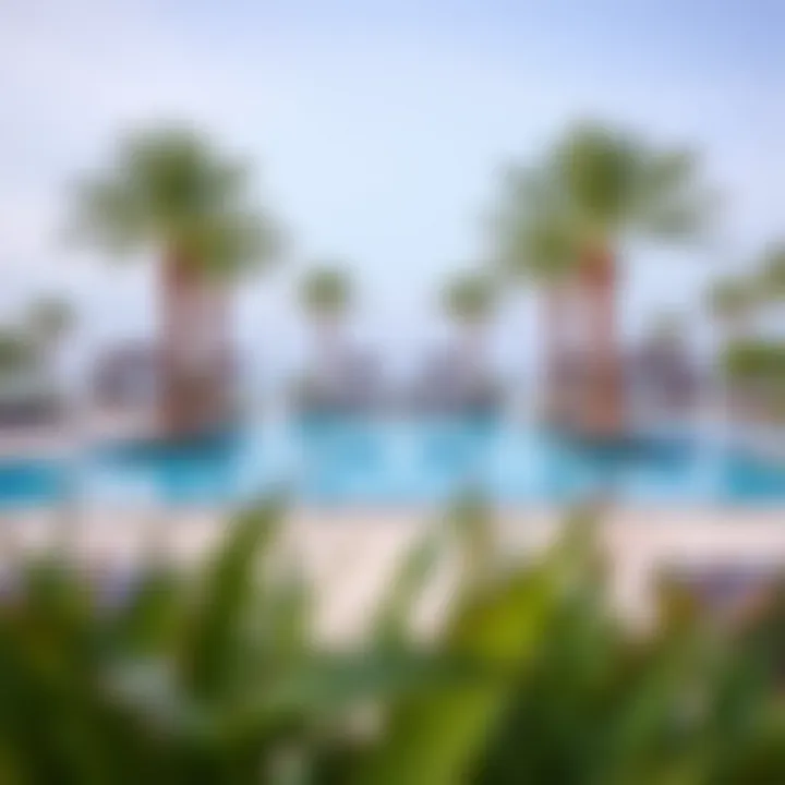 Serene Poolside Experience at Bluewater Residence Resort-style swimming pool at Bluewater Residence surrounded by palm trees