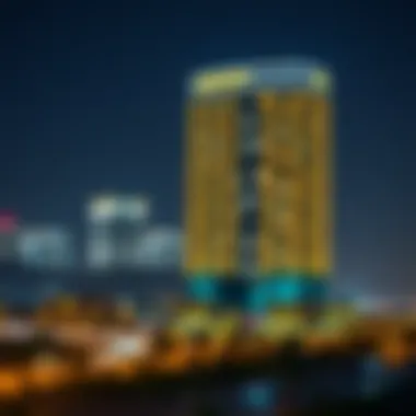 Night view of the Darwish Building with vibrant city lights