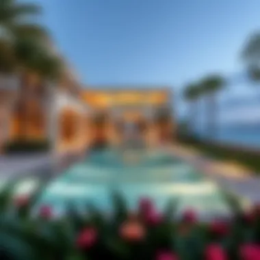 Luxurious swimming pool area surrounded by elegant landscaping